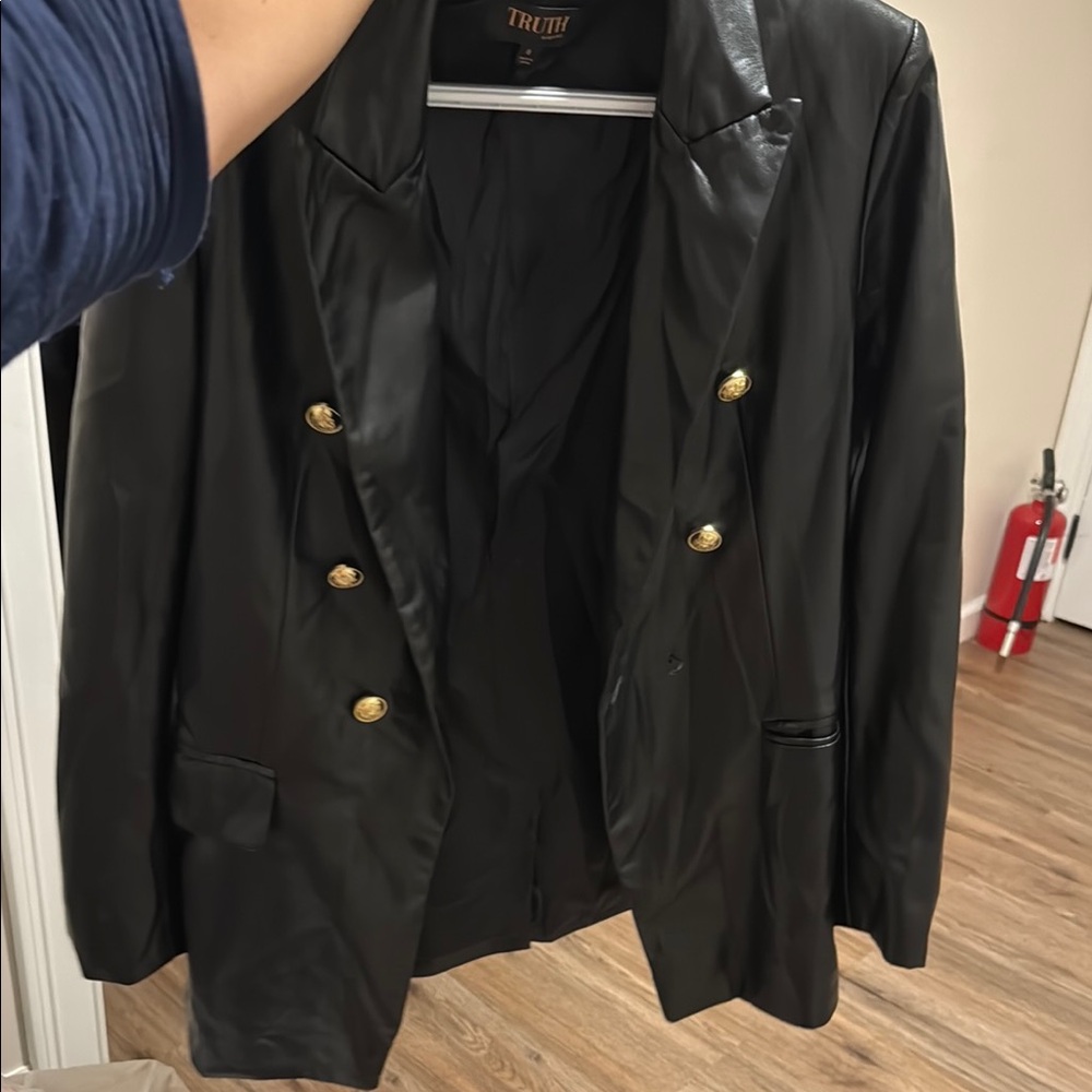 Truth Black Jacket with Gold Accents